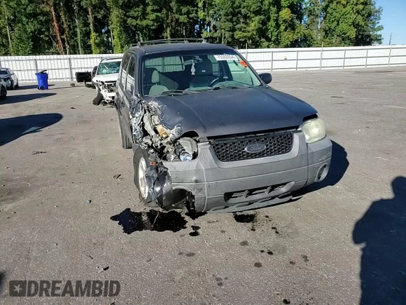 2005 Ford Escape XLT with VIN 1FMCU93105KA96729, listed as a Copart auction lot 75553354 with 220,081 mi miles and Salvage Title. Bid and sale history available at DreamBid. Image 12.