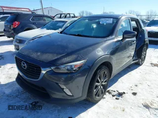 2017 Mazda CX-3 Touring with VIN JM1DKFC72H0167205, listed as a IAAI auction lot 41333632 with 106,063 mi miles. Bid and sale history available at carsss.com. Image 18.