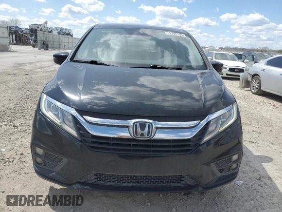 2018 Honda Odyssey EX-L with VIN 5FNRL6H77JB009851, listed as a Copart auction lot 52203155 with 127,575 mi miles and Salvage Title. Bid and sale history available at carsss.com. Image 5.