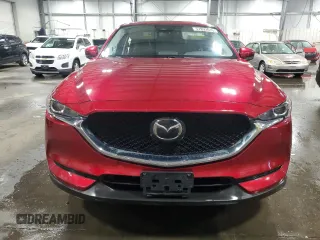2018 Mazda CX-5 Touring z VIN JM3KFBCM5J0462676, wystawiony jako Copart lot #57892015 z przebiegiem 76 566 mil mil oraz Szkoda całkowita • Salvage title. Historia ofert i sprzedaży dostępna na DreamBid. Obrazek 5.