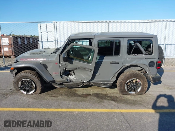 2020 Jeep Wrangler Unlimited Rubicon with VIN 1C4HJXFN4LW136516, listed as a IAAI auction lot 41874403 with 87,576 mi miles. Bid and sale history available at carsss.com. Image 14.