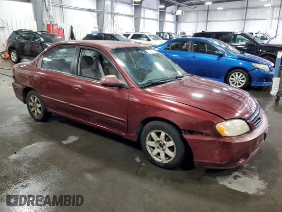 2003 Kia Spectra with VIN KNAFB121735217341, listed as a Copart auction lot 72016504 with 116,224 mi miles and Salvage Title. Bid and sale history available at DreamBid. Image 4.