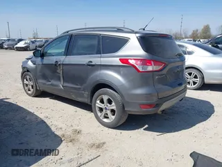 2014 Ford Escape SE with VIN 1FMCU9GX0EUC75145, listed as a IAAI auction lot 42048519 with 186,670 mi miles and . Bid and sale history available at DreamBid. Image 3.