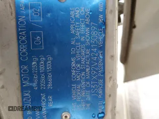 2002 Suzuki XL7 Standard z VIN JS3TX92V424130897, wystawiony jako Copart lot #84635434 z przebiegiem 208 447 mil mil oraz Szkoda całkowita • Salvage title. Historia ofert i sprzedaży dostępna na DreamBid. Obrazek 14.