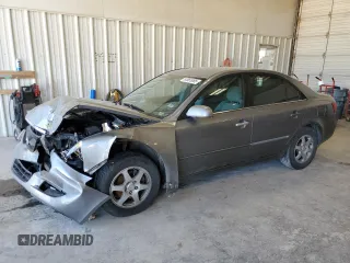 2006 Hyundai Sonata GLS with VIN 5NPEU46FX6H071912, listed as a Copart auction lot 52055095 with 154,280 mi miles and Salvage Title. Bid and sale history available at DreamBid. Image 1.