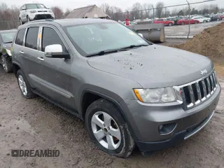 2012 Jeep Grand Cherokee Limited z VIN 1C4RJFBT5CC251193, wystawiony jako IAAI lot #42012981 z przebiegiem 189 090 mil mil oraz . Historia ofert i sprzedaży dostępna na DreamBid. Obrazek 1.