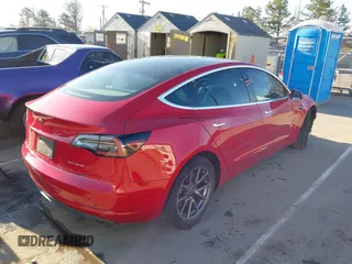 2020 Tesla Model 3 Long Range with VIN 5YJ3E1EB4LF668470, listed as a IAAI auction lot 41743651 with 151,957 mi miles. Bid and sale history available at carsss.com. Image 4.