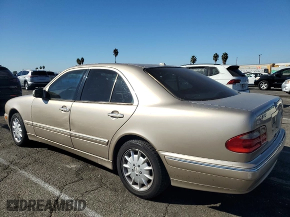 2000 Mercedes-Benz E-Class AWD with VIN WDBJF82G0YX029026, listed as a Copart auction lot 78106604 with 134,482 mi miles and Salvage Title. Bid and sale history available at carsss.com. Image 2.