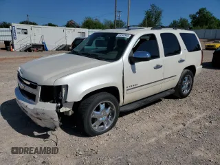 2009 Chevrolet Tahoe LTZ z VIN 1GNFC33J69R286735, wystawiony jako Copart lot #54143955 z przebiegiem 151 003 mil mil oraz Czysty tytuł • Clean title. Historia ofert i sprzedaży dostępna na DreamBid. Obrazek 1.