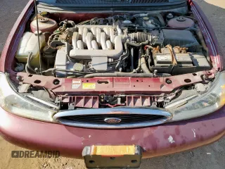 1999 Ford Contour LX with VIN 1FAFP66L2XK167281, listed as a Copart auction lot 64839335 with 256,227 mi miles and Clean title. Bid and sale history available at DreamBid. Image 12.