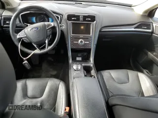 2019 Ford Fusion Hybrid Titanium with VIN 3FA6P0RU0KR144636, listed as a Copart auction lot 44357323 with 100,146 mi miles. Bid and sale history available at carsss.com. Image 8.