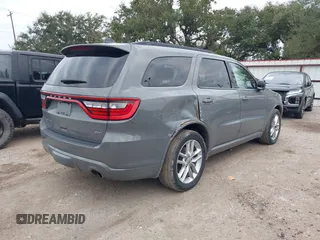2023 Dodge Durango GT Plus with VIN 1C4RDHDG3PC601932, listed as a IAAI auction lot 41238697 with 56,294 mi miles and . Bid and sale history available at DreamBid. Image 4.