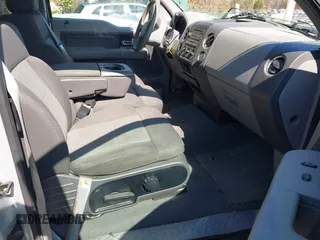 2005 Ford F-150 XLT with VIN 1FTPX145X5NA78866, listed as a IAAI auction lot 41898595 with 173,659 mi miles. Bid and sale history available at carsss.com. Image 5.
