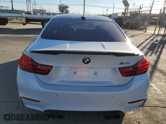 2015 BMW M4 with VIN WBS3R9C50FK331570, listed as a Copart auction lot 80739684 with 84,367 mi miles and Salvage Title. Bid and sale history available at carsss.com. Image 6.