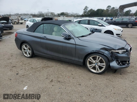 2015 BMW 2 Series 228i with VIN WBA1K5C57FV474037, listed as a Copart auction lot 87857635 with 91,333 mi miles and Salvage title. Bid and sale history available at DreamBid. Image 4.
