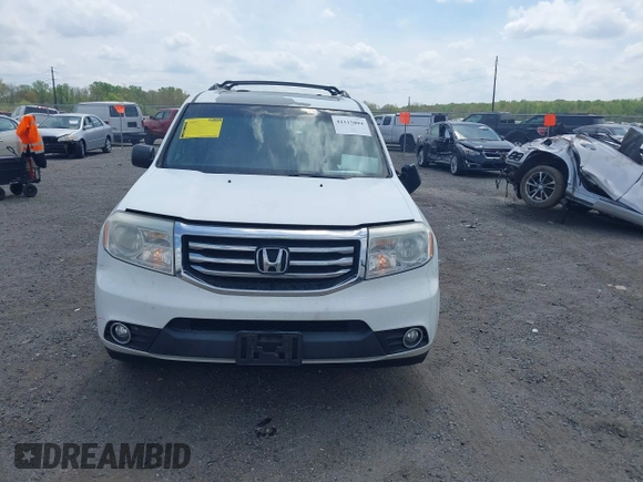 2014 Honda Pilot EX-L with VIN 5FNYF3H50EB005811, listed as a IAAI auction lot 42115804 with 216,033 mi miles and . Bid and sale history available at DreamBid. Image 12.