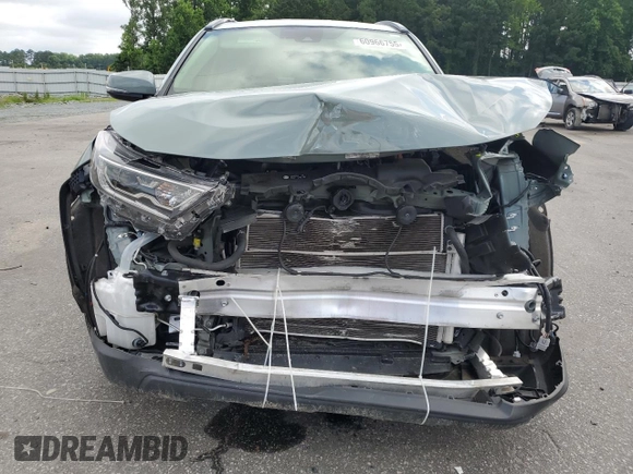 2020 Toyota RAV4 Hybrid XLE with VIN JTMR6RFV5LD003115, listed as a Copart auction lot 60966755 with 53,942 mi miles and Salvage title. Bid and sale history available at DreamBid. Image 5.