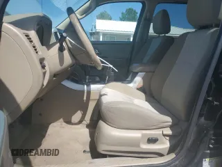 2007 Mercury Mariner Luxury with VIN 4M2YU91177KJ13634, listed as a Copart auction lot 56946825 with 167,163 mi miles and Clean title. Bid and sale history available at DreamBid. Image 7.