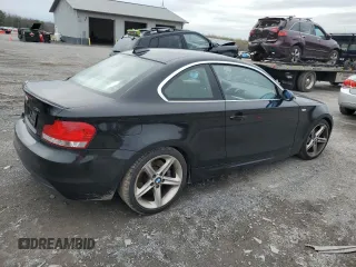 2009 BMW 1 Series 135i with VIN WBAUC73519VK79934, listed as a Copart auction lot 50781795 with 96,817 mi miles and Salvage title. Bid and sale history available at DreamBid. Image 3.