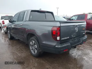 2018 Honda Ridgeline RTL-E with VIN 5FPYK3F74JB012181, listed as a IAAI auction lot 42143197 with 117,520 mi miles and . Bid and sale history available at DreamBid. Image 3.