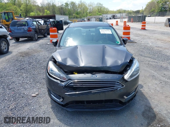 2018 Ford Focus Titanium с VIN 1FADP3J22JL314642, выставлен на аукционе IAAI как лот 42128194 с пробегом 62 787 миль миль и . История ставок и продаж доступна на DreamBid. Изображение 12.