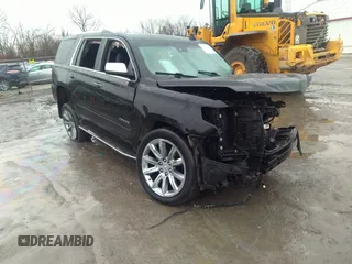 2015 Chevrolet Tahoe LTZ z VIN 1GNSKCKC2FR604348, wystawiony jako IAAI lot #41738566 z przebiegiem 186 325 mil mil oraz . Historia ofert i sprzedaży dostępna na DreamBid. Obrazek 1.