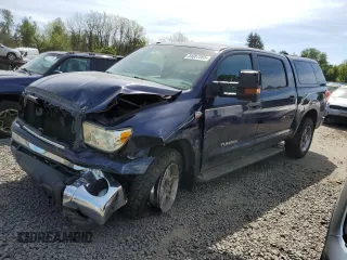 2010 Toyota Tundra with VIN 5TFDY5F10AX110756, listed as a Copart auction lot 54057265 with 189,908 mi miles and Salvage title. Bid and sale history available at DreamBid. Image 1.