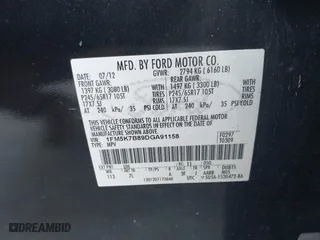 2013 Ford Explorer with VIN 1FM5K7B89DGA91158, listed as a IAAI auction lot 41767236 with 212,406 mi miles. Bid and sale history available at carsss.com. Image 9.