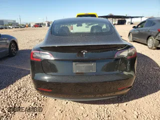 2021 Tesla Model 3 Standard Range Plus with VIN 5YJ3E1EA3MF996701, listed as a Copart auction lot 47013195 with 34,177 mi miles and Salvage Title. Bid and sale history available at carsss.com. Image 6.