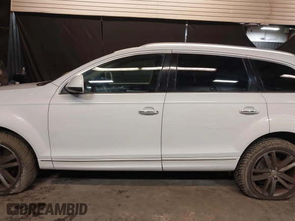 2013 Audi Q7 Premium Plus with VIN WA1LGAFE1DD009705, listed as a IAAI auction lot 41390712 with 99,649 mi miles and . Bid and sale history available at DreamBid. Image 14.