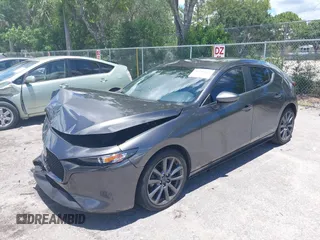 2022 Mazda 3 Select z VIN JM1BPAKL1N1519383, wystawiony jako IAAI lot #39742243 z przebiegiem 20 080 mil mil oraz . Historia ofert i sprzedaży dostępna na DreamBid. Obrazek 17.