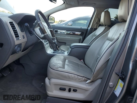 2009 Lincoln MKX with VIN 2LMDU88C69BJ13322, listed as a Copart auction lot 70686844 with 129,384 mi miles and Salvage Title. Bid and sale history available at DreamBid. Image 7.