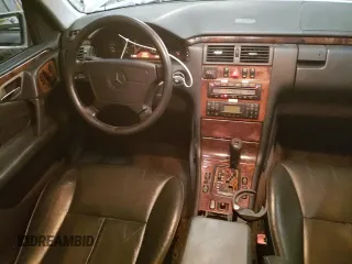 1999 Mercedes-Benz E-Class with VIN WDBJF82H4XX021888, listed as a Copart auction lot 83069274 with 173,198 mi miles and Salvage Title. Bid and sale history available at carsss.com. Image 8.