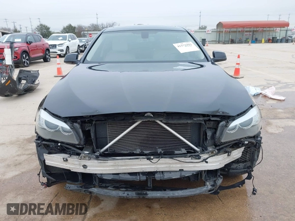 2013 BMW 5 Series 528i xDrive with VIN WBAXH5C50DDW15574, listed as a IAAI auction lot 41572993 with 59,188 mi miles. Bid and sale history available at carsss.com. Image 13.