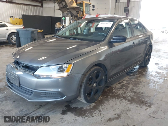 2014 Volkswagen Jetta Sedan S with VIN 3VW2K7AJ5EM410491, listed as a IAAI auction lot 42083614 with 65,960 mi miles. Bid and sale history available at carsss.com. Image 18.