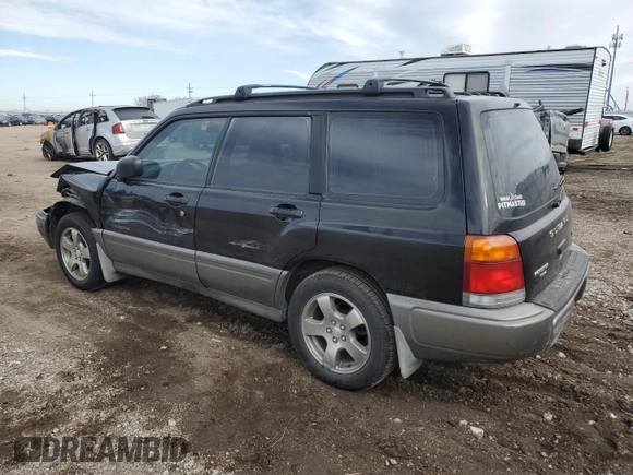 1999 Subaru Forester S with VIN JF1SF6550XH735142, listed as a Copart auction lot 85818264 with 0 mi miles and Salvage Title. Bid and sale history available at carsss.com. Image 2.