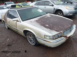 2001 Cadillac Eldorado ESC z VIN 1G6EL12Y41B108796, wystawiony jako IAAI lot #42502160 z przebiegiem Nie podano mil oraz . Historia ofert i sprzedaży dostępna na DreamBid. Obrazek 1.