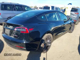 2021 Tesla Model 3 Performance with VIN 5YJ3E1EC6MF999321, listed as a IAAI auction lot 41417451 with 20,562 mi miles and . Bid and sale history available at carsss.com. Image 4.