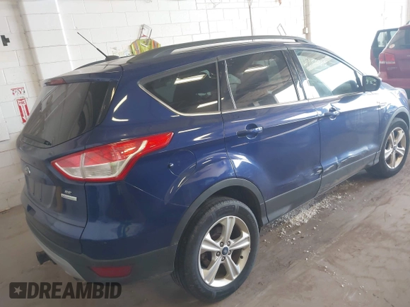 2014 Ford Escape SE with VIN 1FMCU0GX2EUB60350, listed as a IAAI auction lot 42159803 with 109,601 mi miles. Bid and sale history available at carsss.com. Image 4.