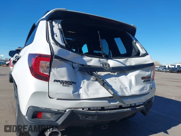 2023 Honda Passport TrailSport with VIN 5FNYF8H60PB015912, listed as a IAAI auction lot 41667749 with 35,019 mi miles and . Bid and sale history available at carsss.com. Image 6.