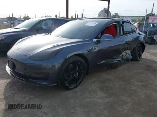 2019 Tesla Model 3 Long Range with VIN 5YJ3E1EB6KF413320, listed as a IAAI auction lot 41760428 with 90,441 mi miles and . Bid and sale history available at DreamBid. Image 18.