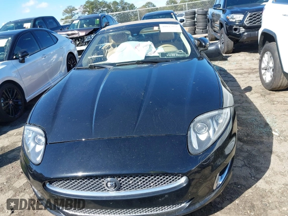 2014 Jaguar XK with VIN SAJWA4GB0ELB52358, listed as a IAAI auction lot 41832850 with 93,037 mi miles. Bid and sale history available at carsss.com. Image 13.