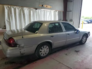2005 Mercury Grand Marquis LS Premium z VIN 2MEHM75W85X650957, wystawiony jako Copart lot #56677604 z przebiegiem 163 446 mil mil oraz Szkoda całkowita • Salvage title. Historia ofert i sprzedaży dostępna na DreamBid. Obrazek 3.