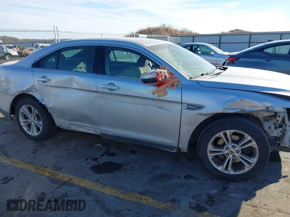 2013 Ford Taurus SEL with VIN 1FAHP2E83DG224780, listed as a IAAI auction lot 41675601 with 166,977 mi miles. Bid and sale history available at carsss.com. Image 13.