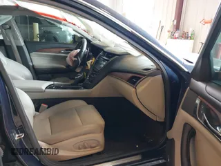 2015 Cadillac CTS AWD z VIN 1G6AW5SXXF0136481, wystawiony jako IAAI lot #42173024 z przebiegiem 128 984 mil mil oraz . Historia ofert i sprzedaży dostępna na DreamBid. Obrazek 5.