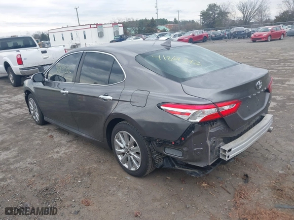 2020 Toyota Camry LE with VIN 4T1C11AK0LU400052, listed as a IAAI auction lot 41861392 with 71,213 mi miles. Bid and sale history available at carsss.com. Image 3.