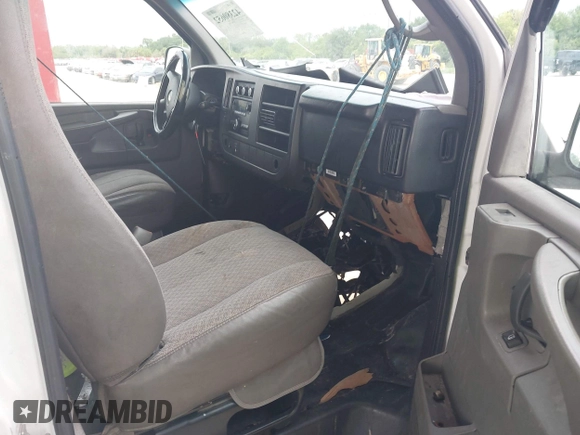 2011 Chevrolet Express Cargo with VIN 1GCWGGCA3B1127003, listed as a IAAI auction lot 42380652 with 158,049 mi miles and . Bid and sale history available at DreamBid. Image 5.