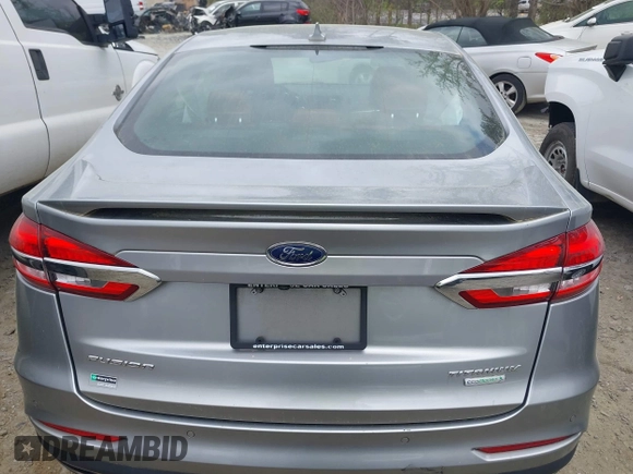 2020 Ford Fusion Titanium с VIN 3FA6P0K91LR128016, выставлен на аукционе IAAI как лот 41947905 с пробегом 79 622 миль миль и . История ставок и продаж доступна на DreamBid. Изображение 16.