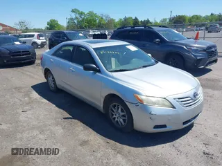 2007 Toyota Camry CE with VIN JTNBE46K173119853, listed as a IAAI auction lot 42133844 with 243,587 mi miles and . Bid and sale history available at DreamBid. Image 1.