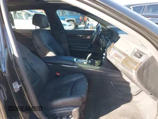 2014 BMW 7 Series 740Li with VIN WBAYE4C56ED137847, listed as a IAAI auction lot 39452255 with 184,471 mi miles. Bid and sale history available at carsss.com. Image 5.